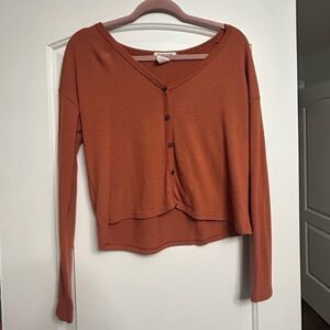 orange long sleeve top